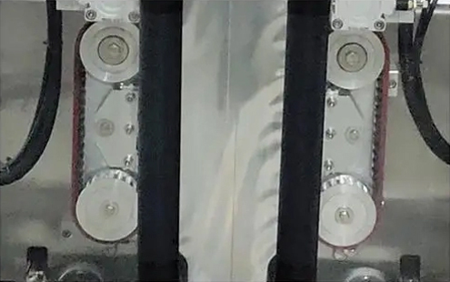 جزئیات دستگاه بسته بندی کیسه گوست - چرخ کشش کیسه همگام